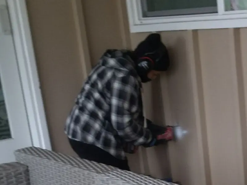 Professional electrician installing an exterior outlet in Chocolay