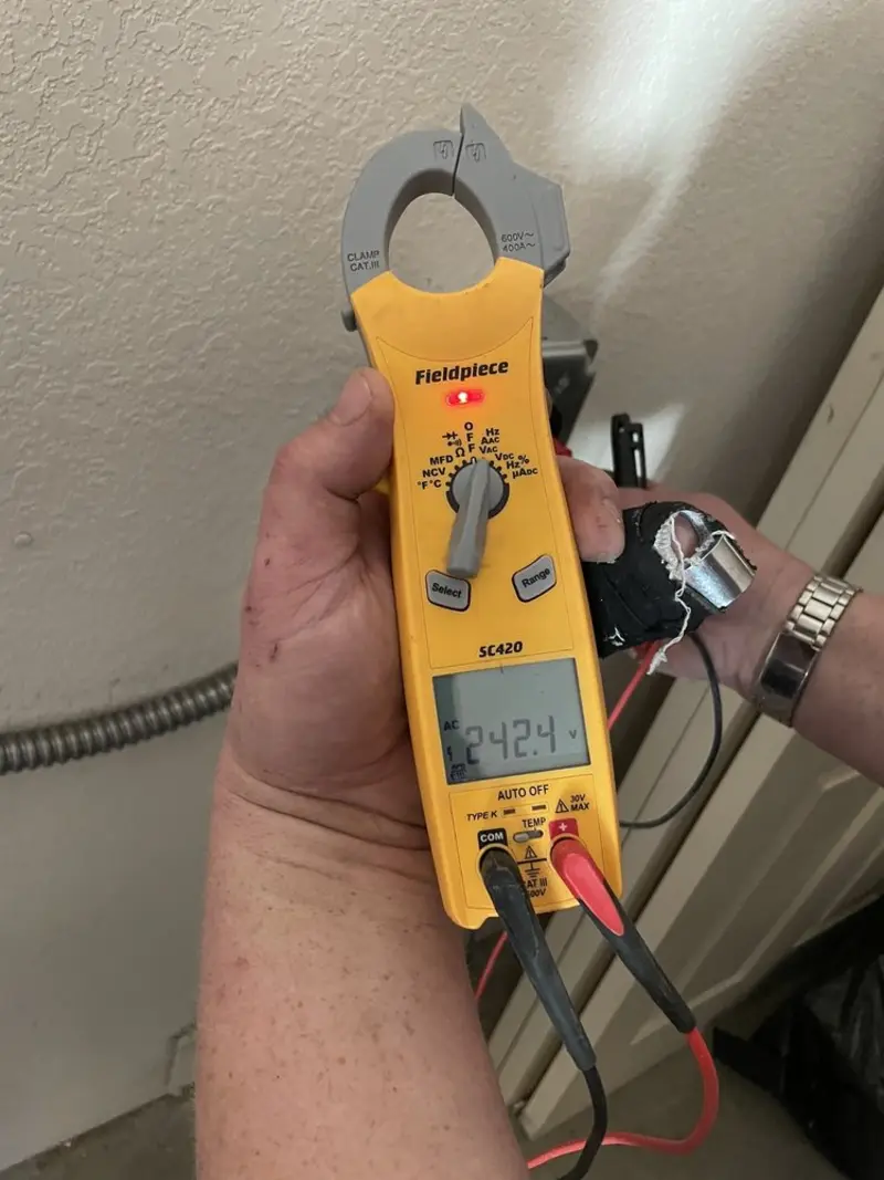 Voltage testing with clamp meter during Hot Tub / Pool Electrical Wiring in Chocolay